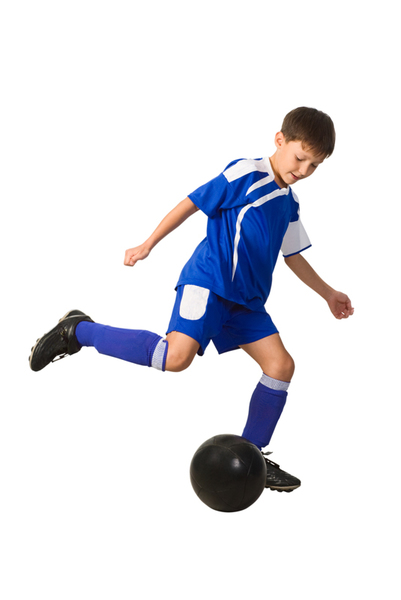 A young boy football player in blue uniform isolated on white
